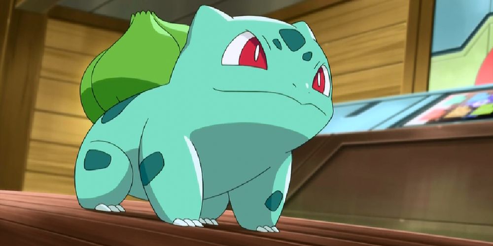 a bulbasaur sitting on the ground in the tv show.