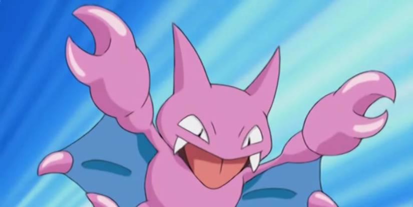 pokemon gligar floating through air with blue background