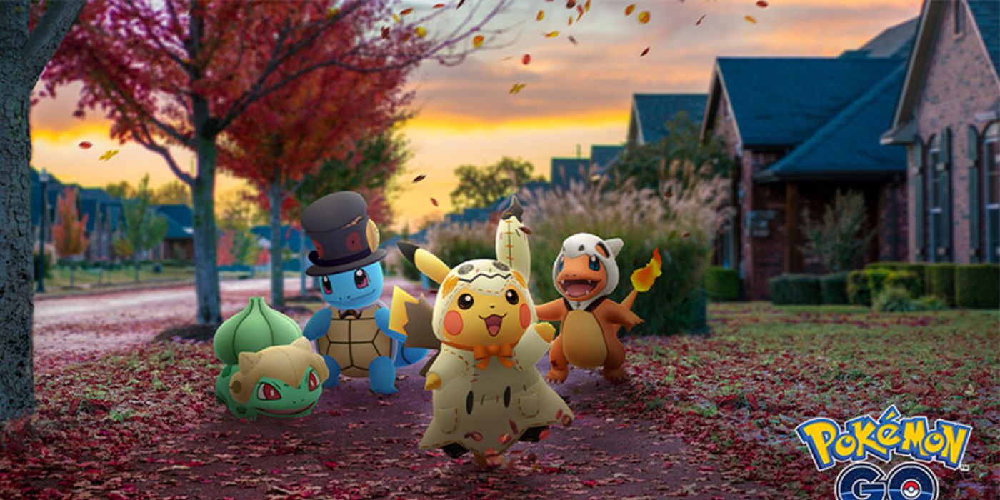 pokemon go halloween event bulbasaur squirtle pikachu and charmander in halloween costumes walk through town on autumn day sunset