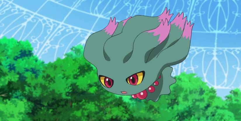 pokemon misdreavus floating in greenhouse with plants and glass behind it