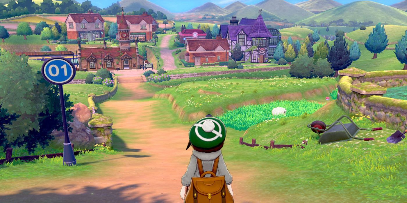 pokemon-sword-and-shield-player-on-hill-overlooking-town