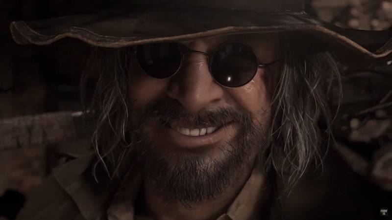 Karl Heisenberg smiles behind dark round glasses