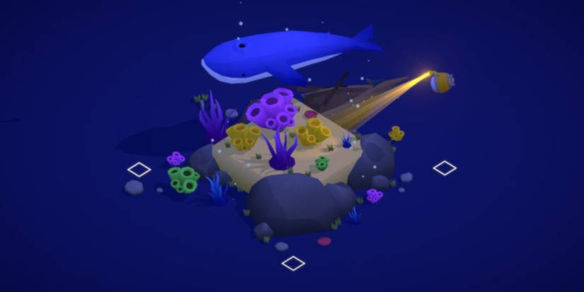 whale circling underwater diorama of sponges and other underwater items