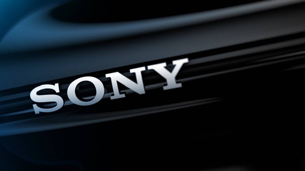 Close-up of the Sony logo on what looks like a PS3 Slim.
