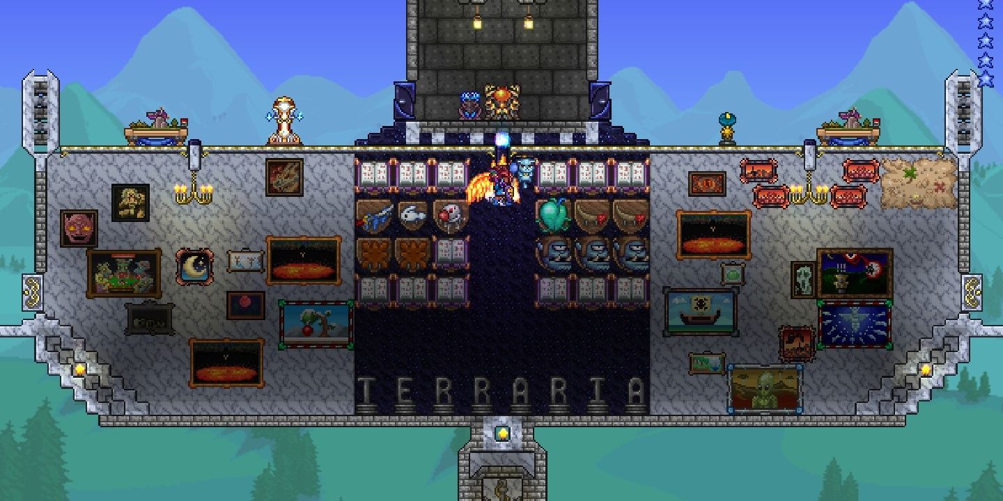 A collection of paintings hanging in a base in Terraria