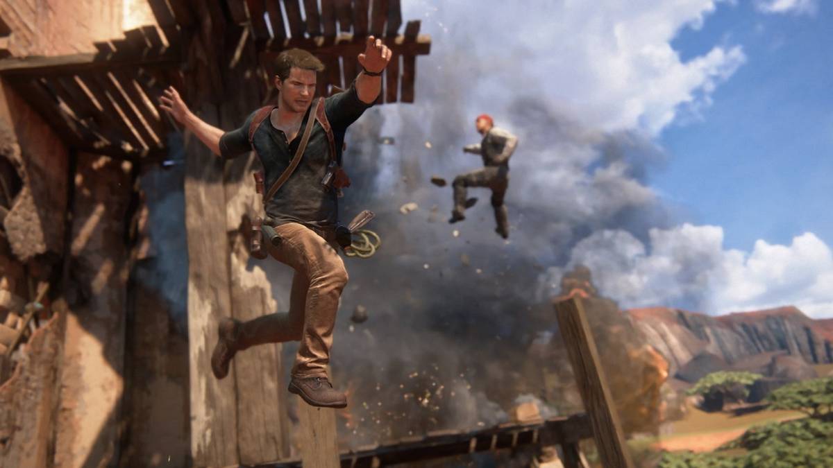 Screenshot from Uncharted 4 showing Nathan Drake leaping off a cliff.