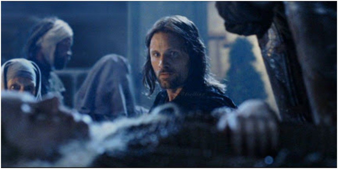 Aragorn Looking At An Injured Éowyn