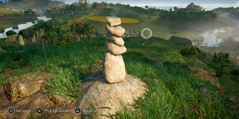 a completed cairn on a cliff.