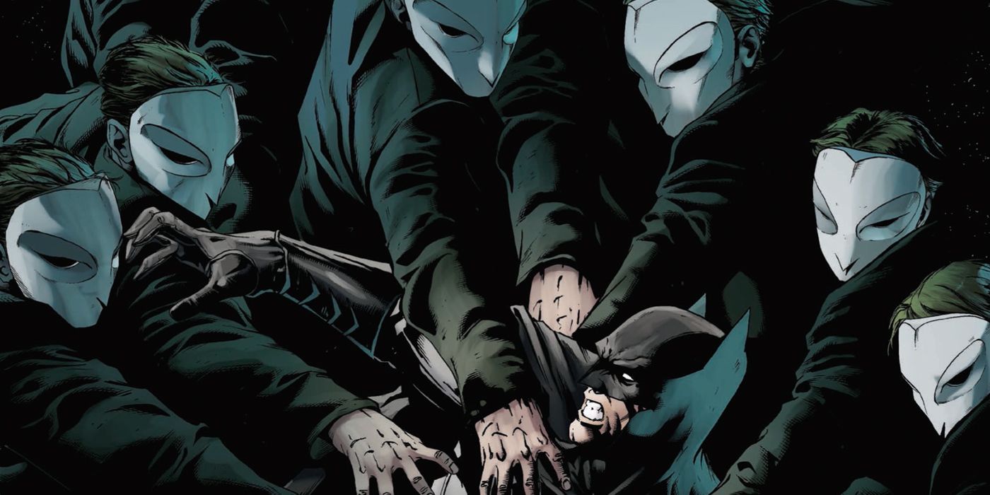 Batman surounded by the Court of Owls