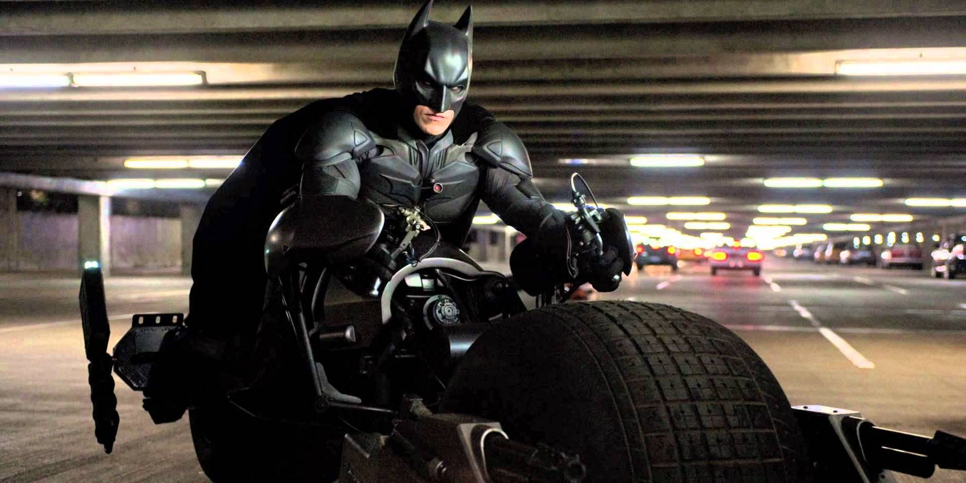 Christian Bale as Batman on the Batpod