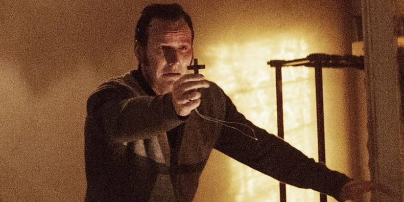 Ed Holding Cross Conjuring 2