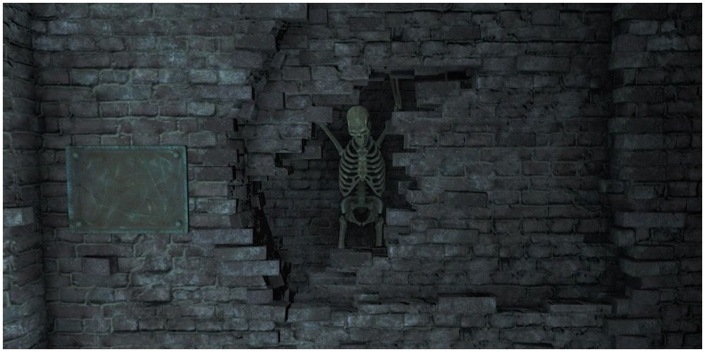 A skeleton chained up in the wall
