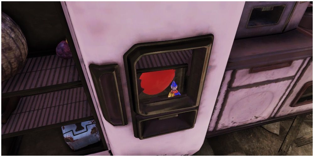 A clown doll in one of the refrigerators of the game