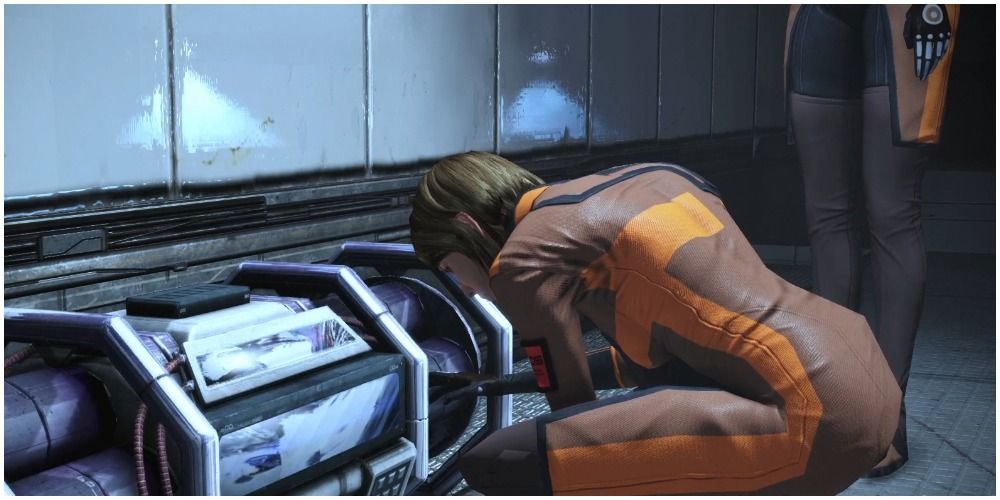 Mass Effect Legendary Edition Kate Bowman Trying To Disable The Bomb