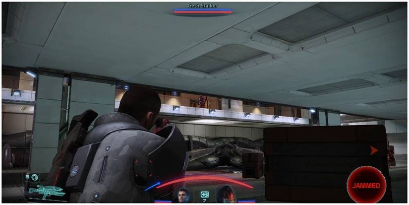 Mass Effect Legendary Edition Shooting At A Geth Stalker From The Ground