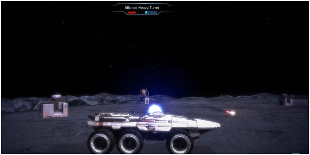 Mass Effect Legendary Edition Shooting At The Turrets At Luna Base