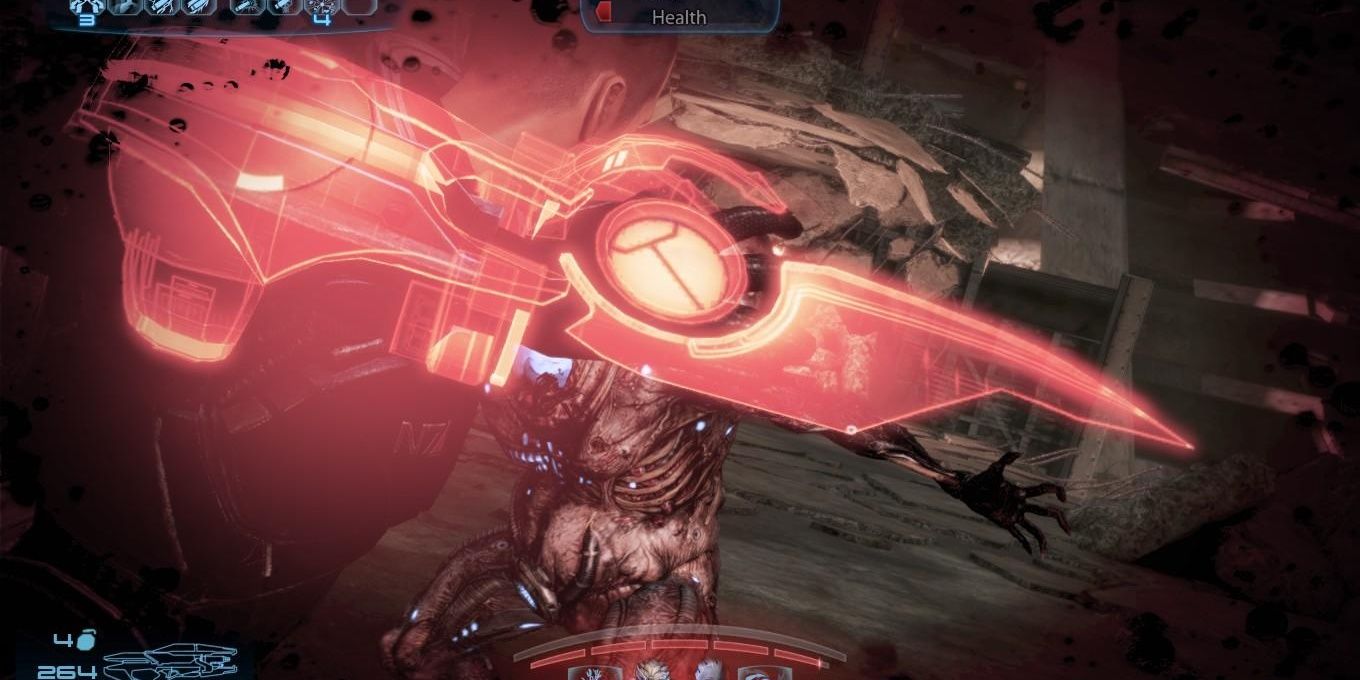 A damaged Shepard uses an Omni-Blade in Mass Effect 3