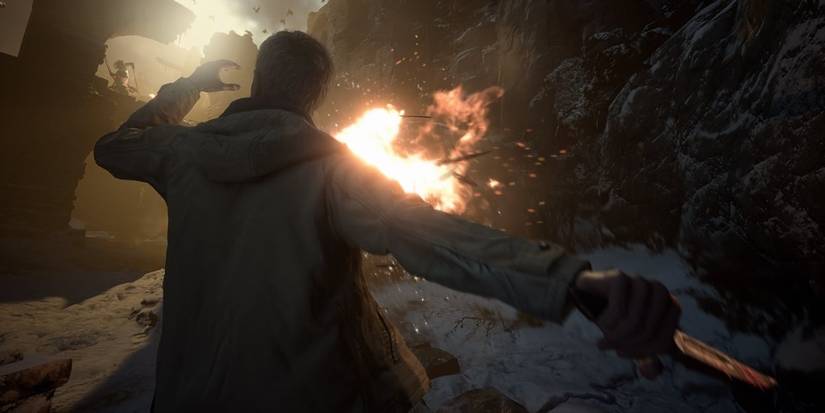 Resident Evil Village Ethan Winters knifing an arrow