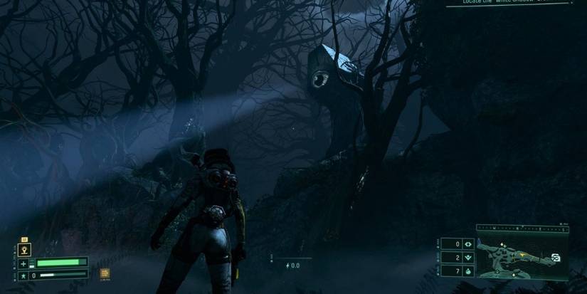 Vines and tentacles hang down in the forest in Returnal to lift up players