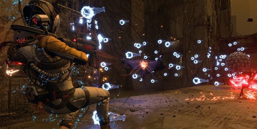 returnal player shooting at an enemy