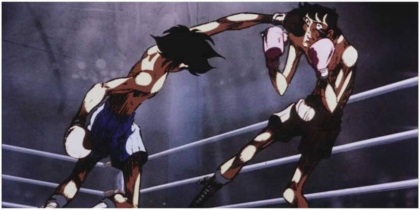 Two boxers punching it out in the ring