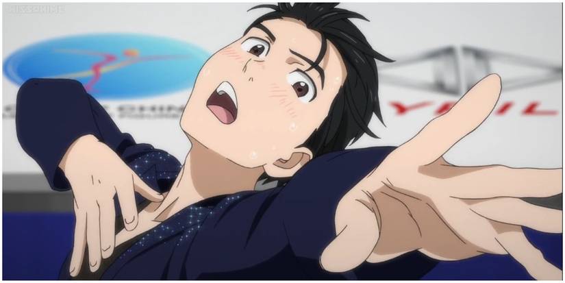 A man in a dramatic figure skating pose