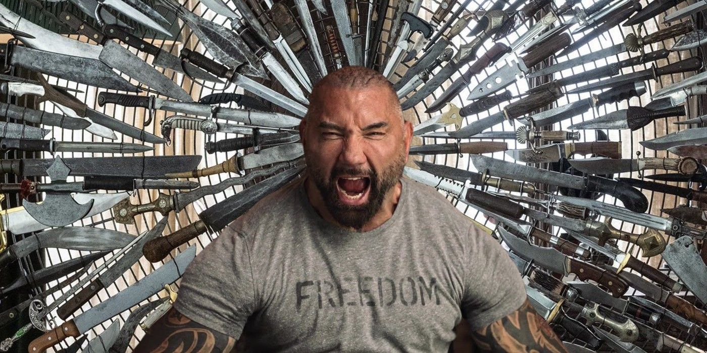 Dave Bautista with the Knives Out chair