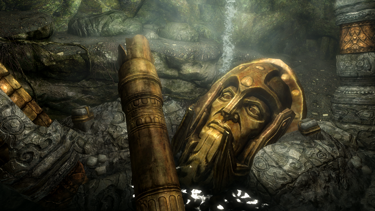 Screenshot from Elder Scrolls showing a broken dwemer statue undergound.