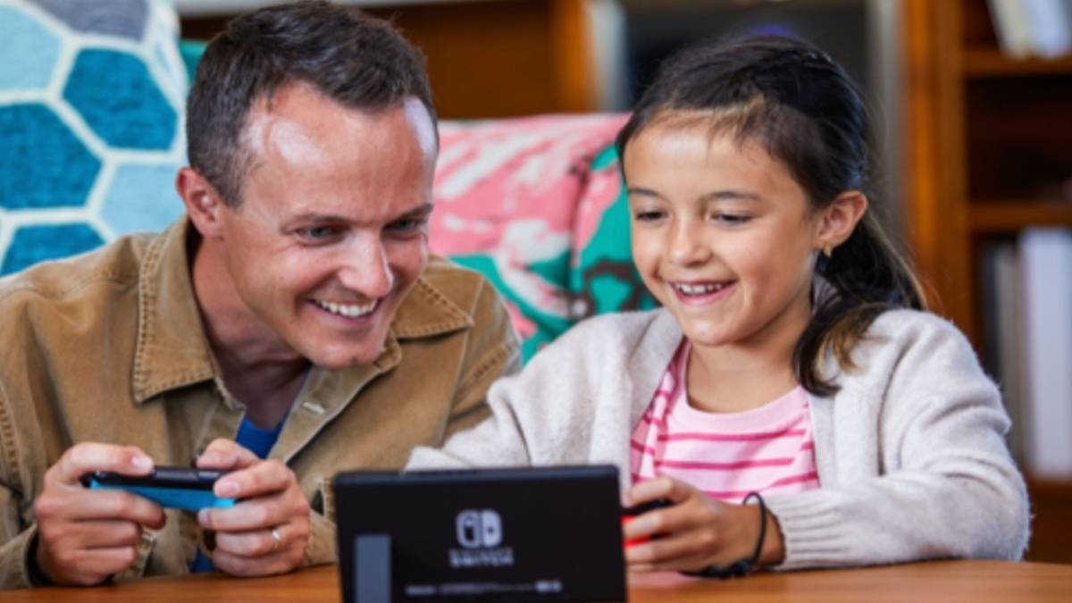 family playing switch portable