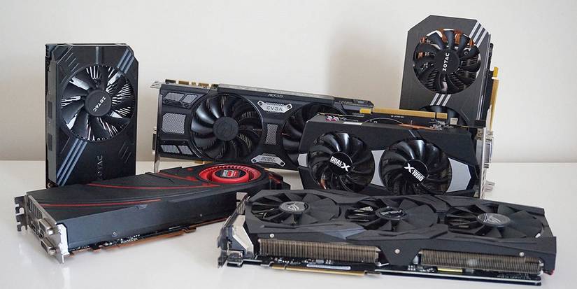 Photo of several Nvidia graphics cards on a white table.