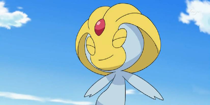 uxie smiling while flying in a blue sky.