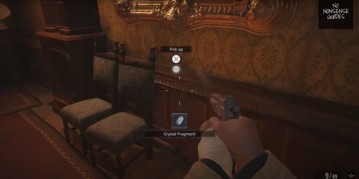 resident evil village main hall crystal fragment location after Ethan shoots it down from portrait