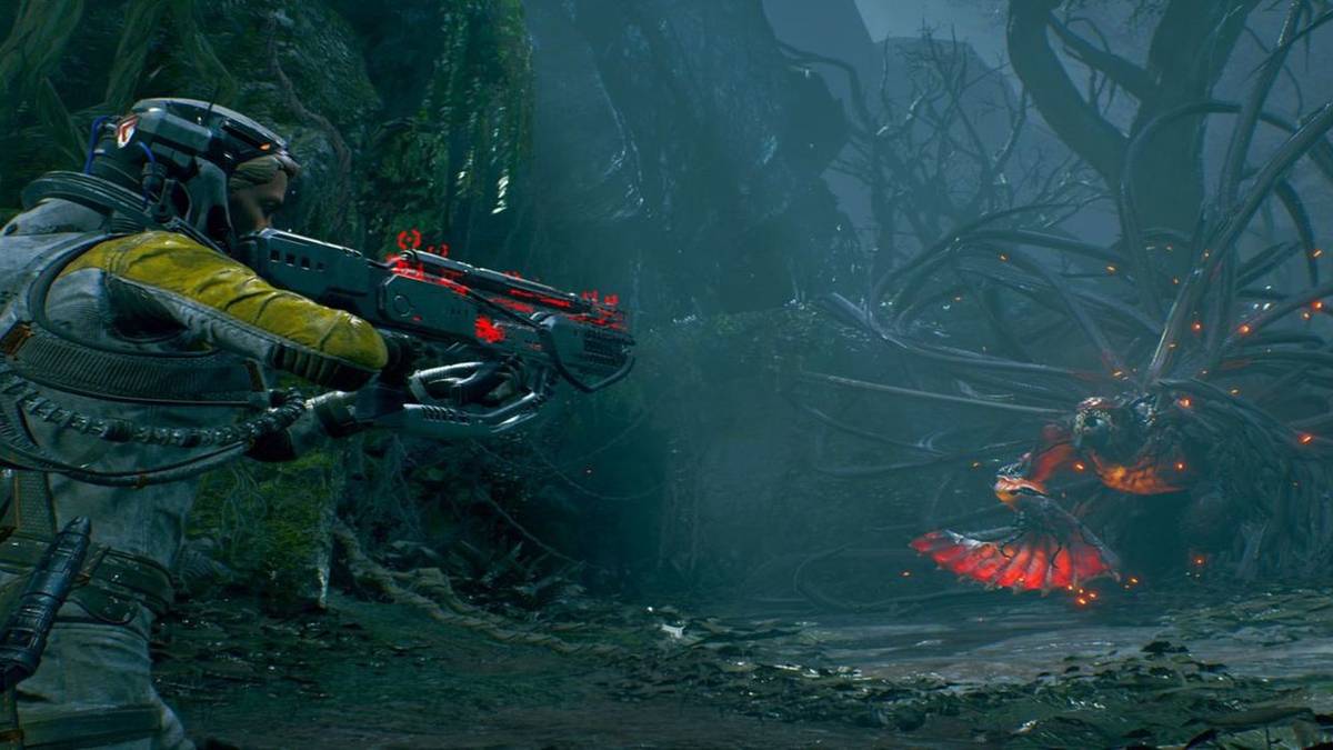 returnal selene firing at red enemy