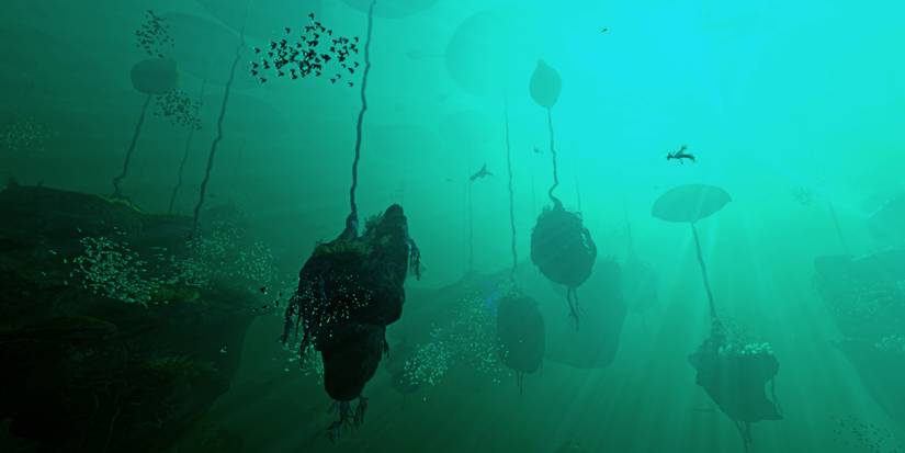 odd rock formations in turquoise water.
