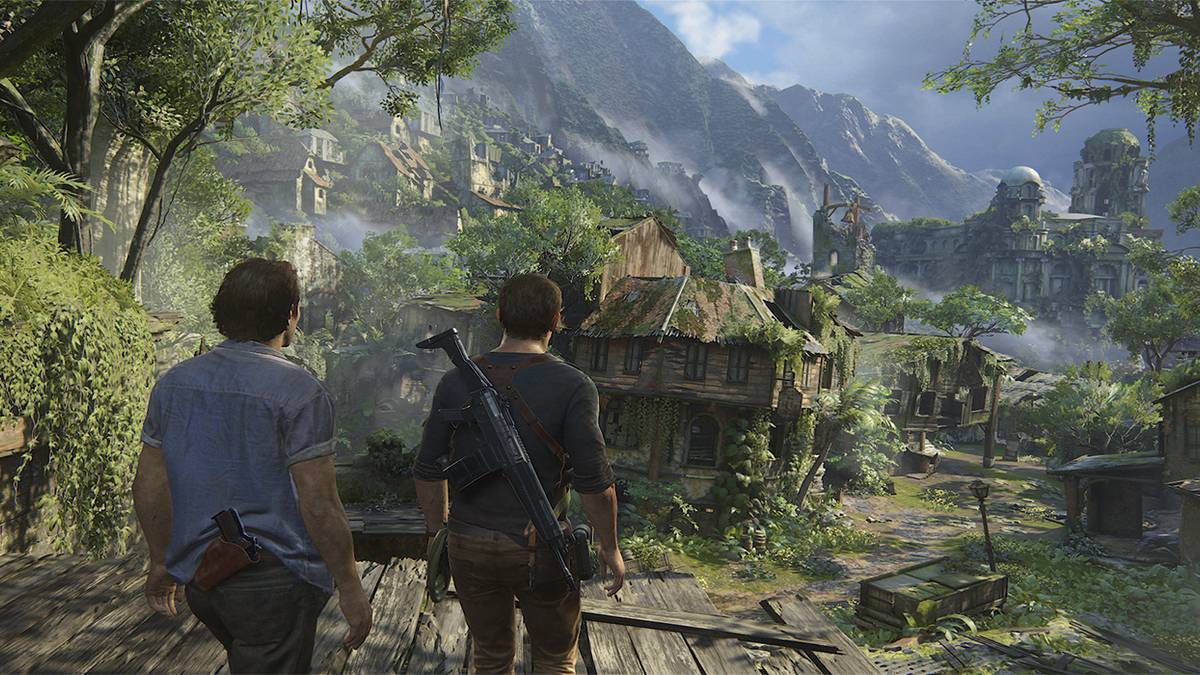 Nathan Drake stands with his brother Sam overlooking a dilapidated village