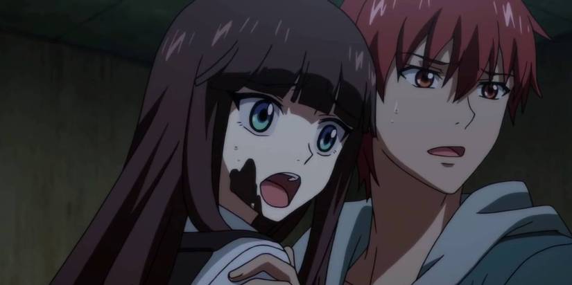 A girl reacts in shock while a boy holds her in Jie Mo Ren