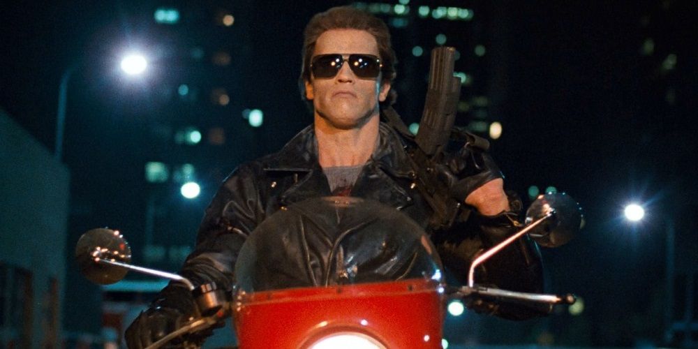 Arnold Schwarzenegger as the T-800 riding a motorcycle in The Terminator