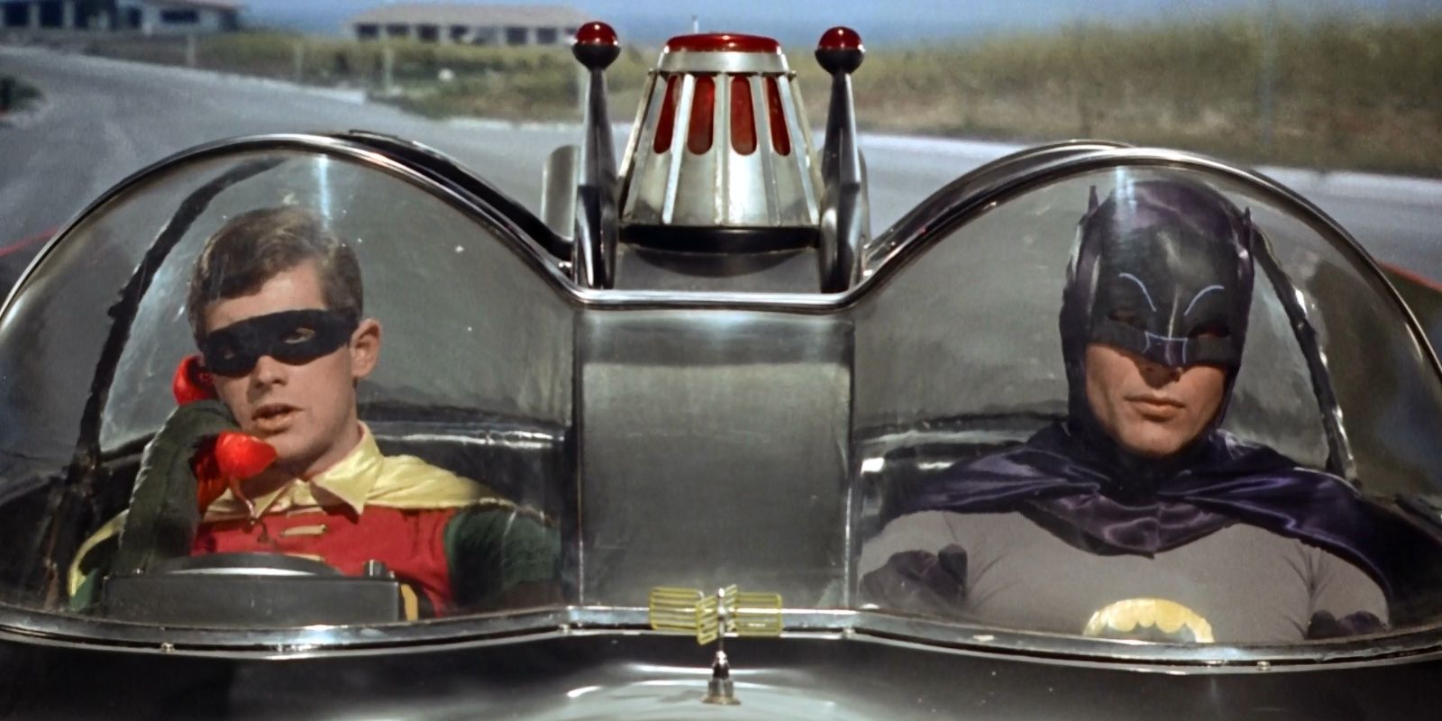 Batman and Robin ride in the Batmobile in 1966 Batman movie