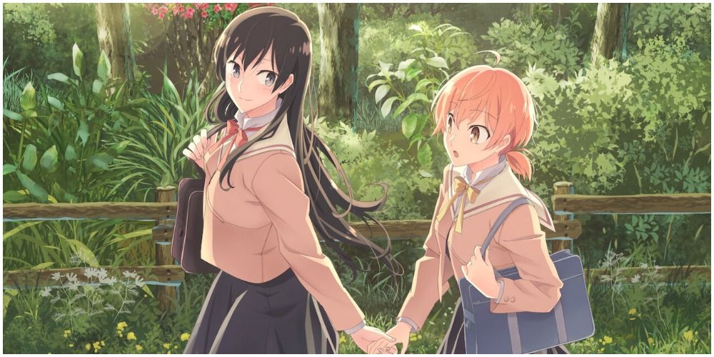 Two girls holding hands