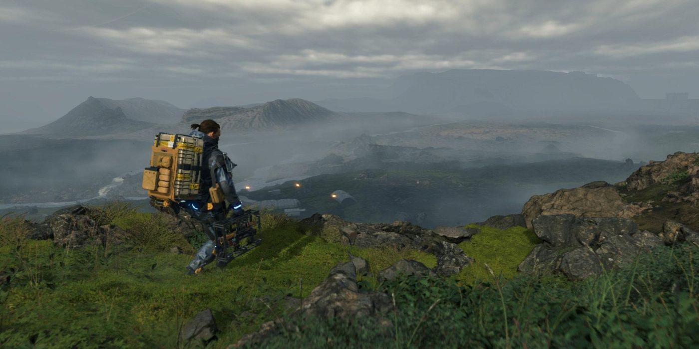 Death Stranding Standing On Top of Mountain