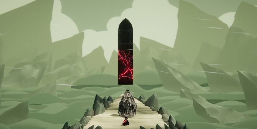 A large black obelisk stands tall in front of the player.