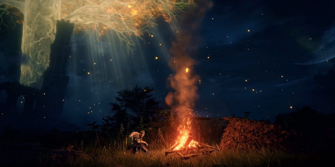 Protagonist resting at bonfire outdoors at night in Elden Ring