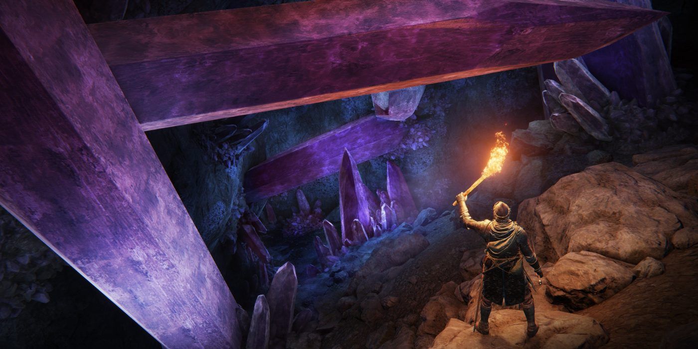 Protagonist discovering a cave of full of crystals in Elden Ring