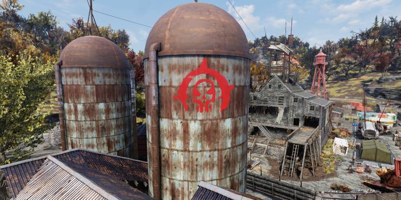 red graffiti on a silo.
