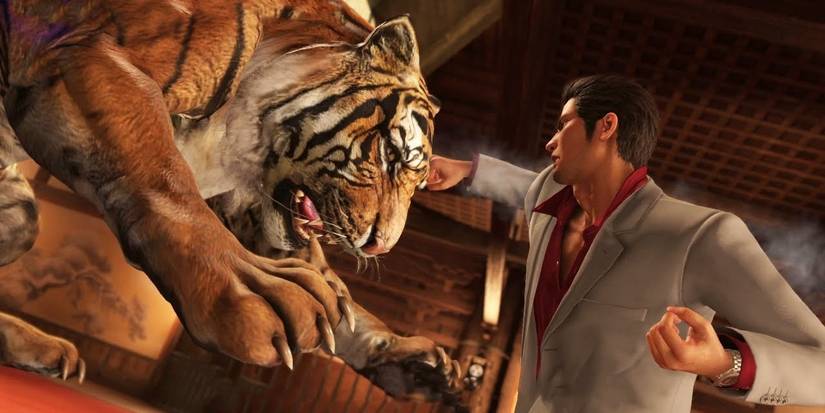 Kazuma Kiryu punching a tiger in Yakuza Kiwami 2