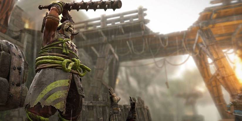 For Honor player raising a spiked club