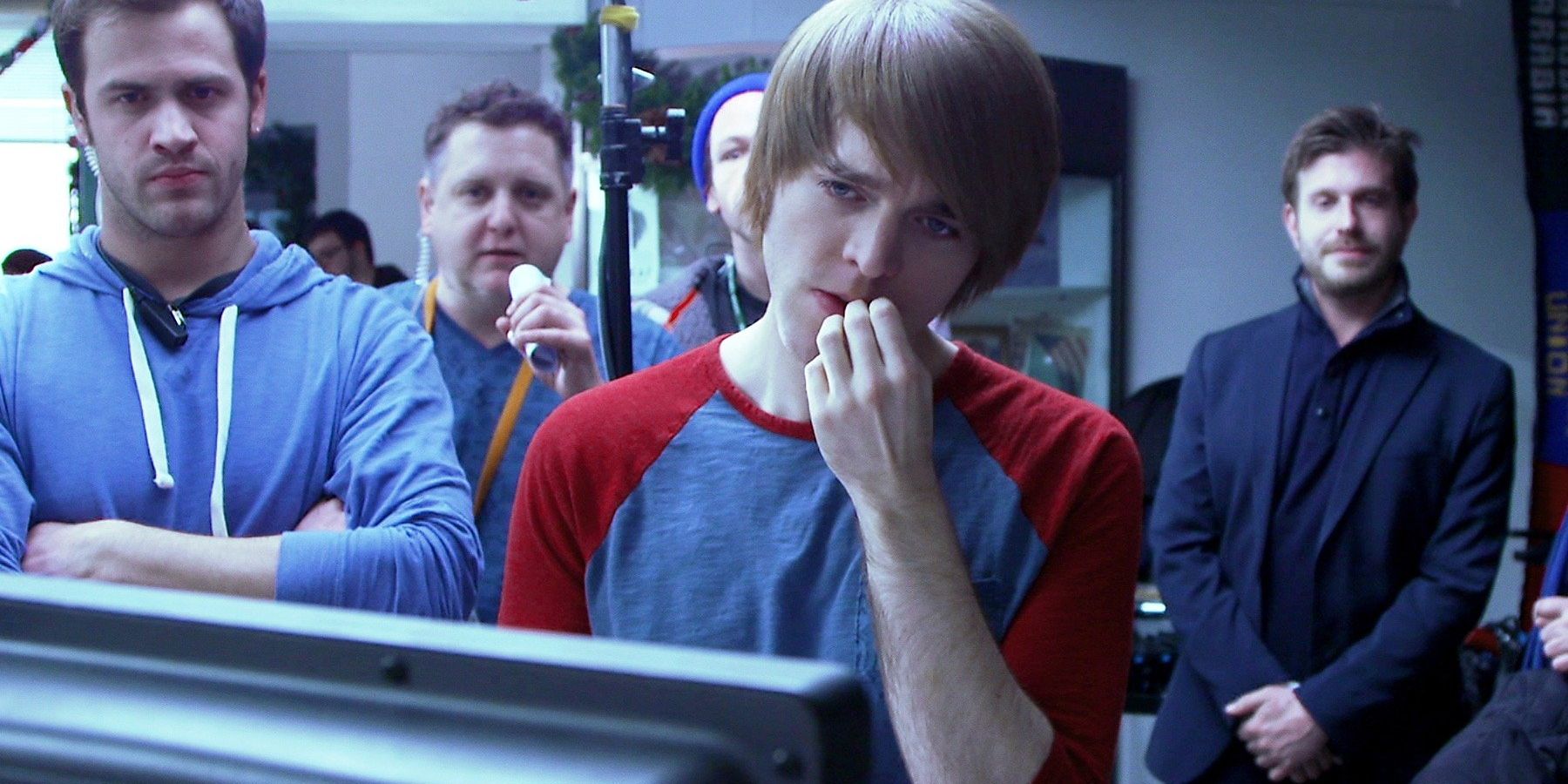 Shane Dawson picks at his lip nervously while directing his film 'Not Cool' in a scene from Starz's 'The Chair'