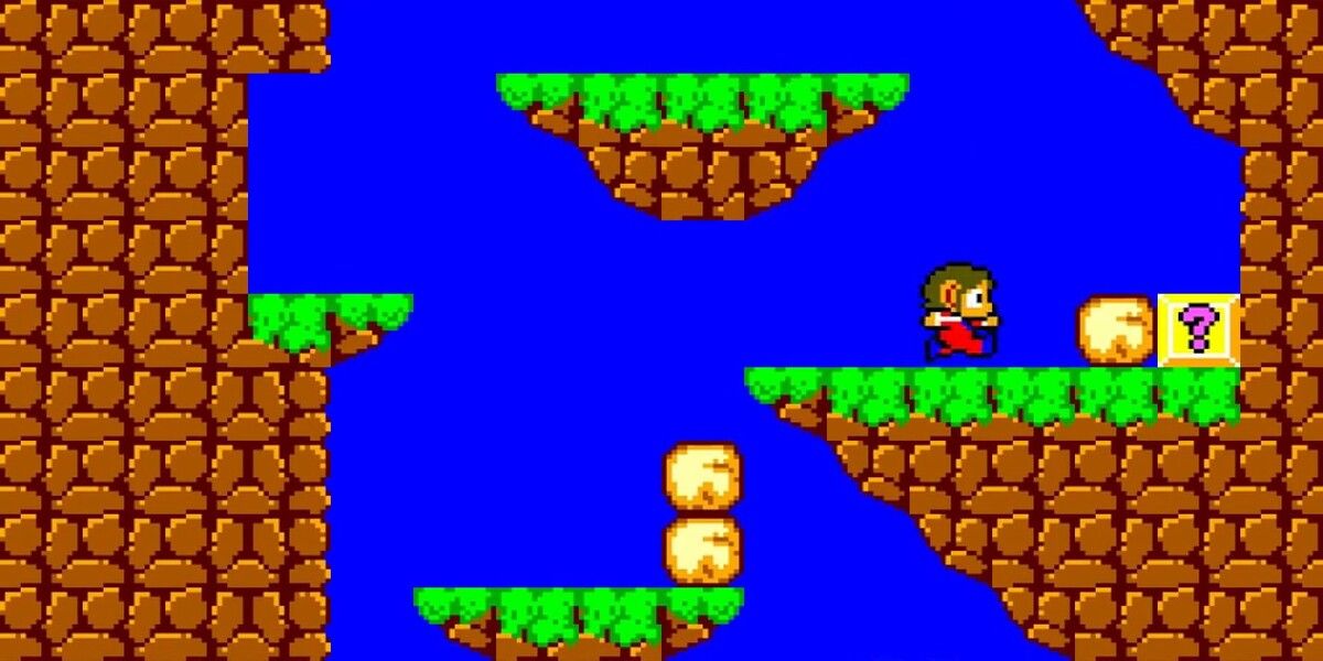 Protagonist platforming on ledges in Alex Kidd in the Miracle World