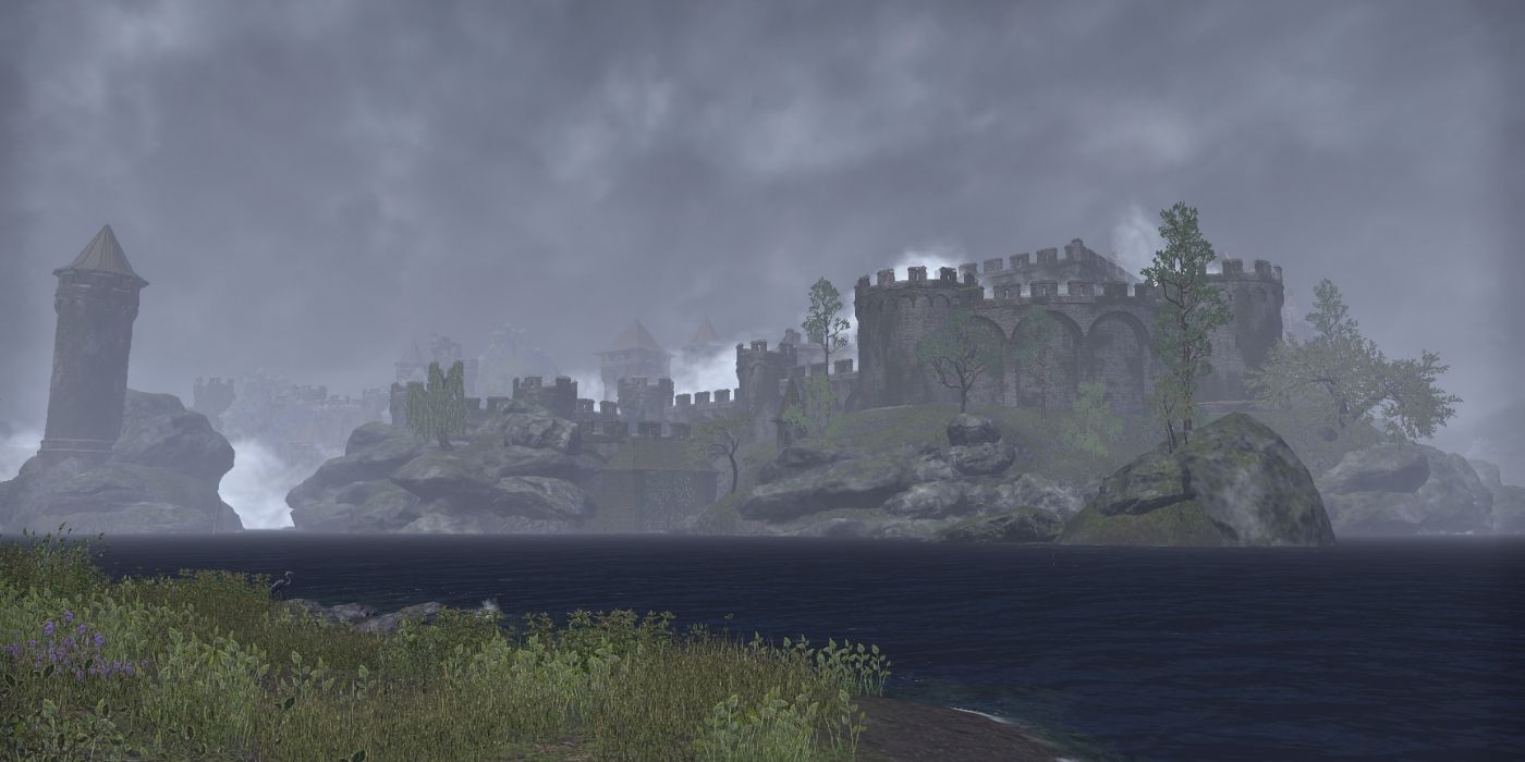 misty castle across lake