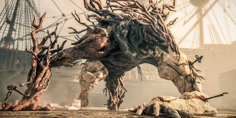 first boss of the game that is a large humanoid covered in wood.